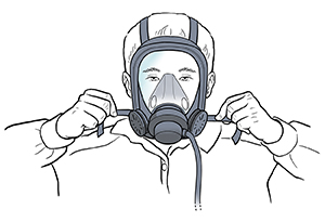 Man adjusting straps on respirator face mask.